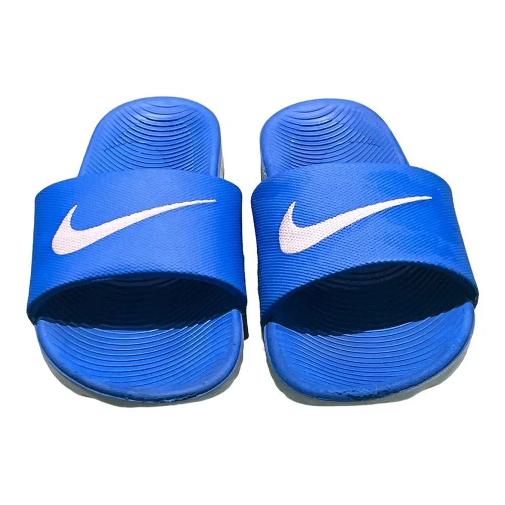 Nike Unisex Royal Blue Sides Size 7Y.